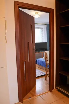 Łóżko lub łóżka w pokoju w obiekcie Prywatne mieszkanie - Sobieskiego 6