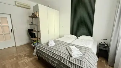 Łóżko lub łóżka w pokoju w obiekcie Apartament Warszawa