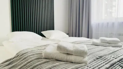 Łóżko lub łóżka w pokoju w obiekcie Apartament Warszawa
