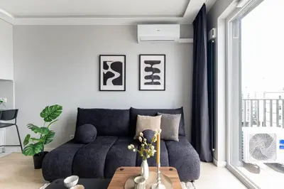 Część wypoczynkowa w obiekcie Herbu Oksza Apartment Ursus AC Parking by Mia