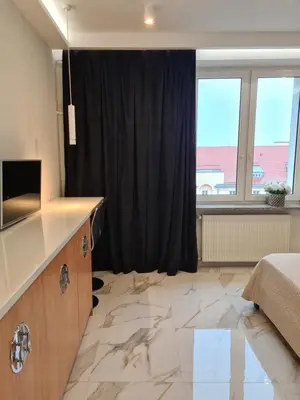 Telewizja i/lub zestaw kina domowego w obiekcie Studio Plac Narutowicza