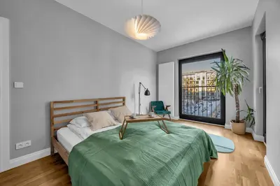 Łóżko lub łóżka w pokoju w obiekcie Rydygiera Prestige Suites - 104m2, Parking, Balcony - by Rentujemy