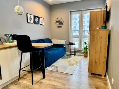 Łóżko lub łóżka w pokoju w obiekcie Cozy Nest Ogrody Włochy