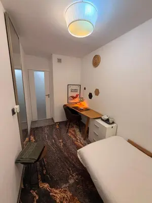 Łóżko lub łóżka w pokoju w obiekcie Sloth Room