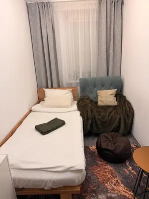 Łóżko lub łóżka w pokoju w obiekcie Sloth Room