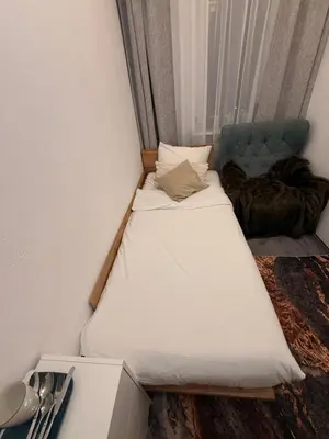 Łóżko lub łóżka w pokoju w obiekcie Sloth Room