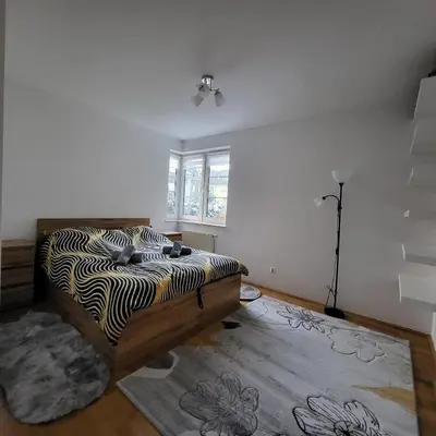 Łóżko lub łóżka w pokoju w obiekcie Warszawa, Maszynowa