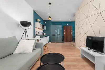 Telewizja i/lub zestaw kina domowego w obiekcie Żupnicza 20 by Homeprime