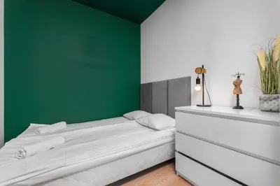 Łóżko lub łóżka w pokoju w obiekcie Żupnicza 20 by Homeprime