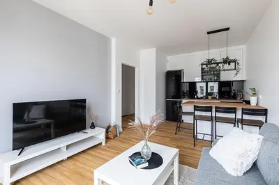 Telewizja i/lub zestaw kina domowego w obiekcie Św Stanisława SuperApart - Comfortable Apartment with Parking