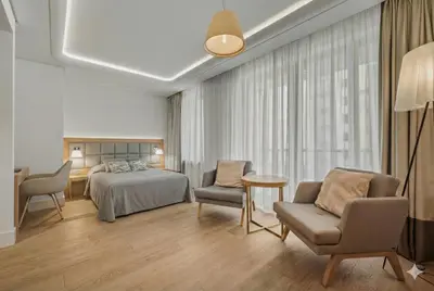 Łóżko lub łóżka w pokoju w obiekcie Mokotów Cybernetyki Three Apartments Warsaw