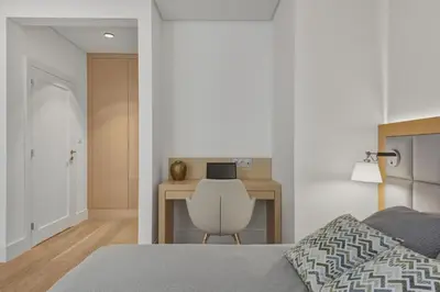 Łóżko lub łóżka w pokoju w obiekcie Mokotów Cybernetyki Three Apartments Warsaw