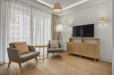 Telewizja i/lub zestaw kina domowego w obiekcie Mokotów Cybernetyki Three Apartments Warsaw
