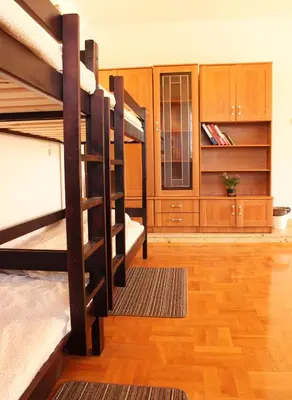 Łóżko lub łóżka w pokoju w obiekcie Gostiny Dom Agatowa, Targówek