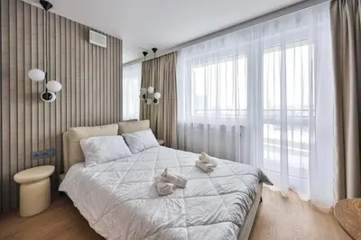Łóżko lub łóżka w pokoju w obiekcie I PerfectApart I Pileckiego 59 I Parking I 419 & 417