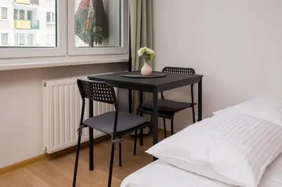 Łóżko lub łóżka w pokoju w obiekcie Bielany Urban Living Apartment by BookingHost