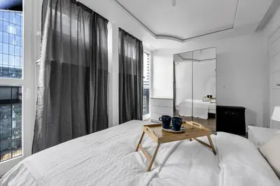 Łóżko lub łóżka w pokoju w obiekcie 11th Floor Center Apartment - 57m2, Two Bedrooms - by Rentujemy