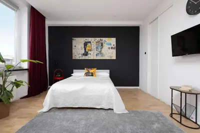 Telewizja i/lub zestaw kina domowego w obiekcie Cosy Studio for 3 People in the Warsaw Center by Noclegi Renters