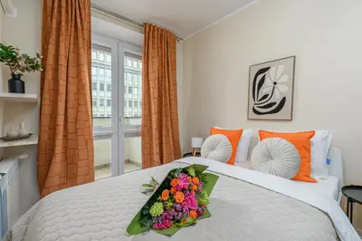 Łóżko lub łóżka w pokoju w obiekcie Lumina cozy apartment in the city center