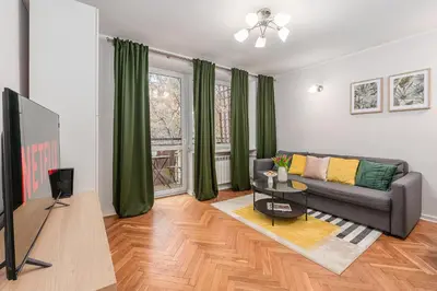 Telewizja i/lub zestaw kina domowego w obiekcie Lumina cozy apartment in the city center