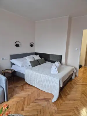 Łóżko lub łóżka w pokoju w obiekcie Smart Studio 5 min Walk to Central Station Złote Tarasy