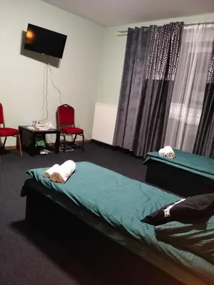 Łóżko lub łóżka w pokoju w obiekcie Villa Varzob lll