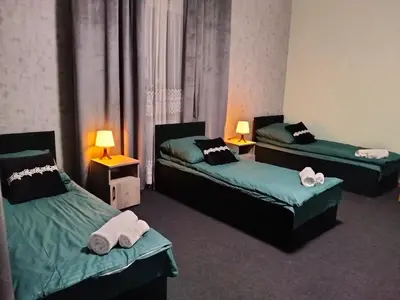 Łóżko lub łóżka w pokoju w obiekcie Villa Varzob lll