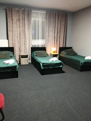 Łóżko lub łóżka w pokoju w obiekcie Villa Varzob lll