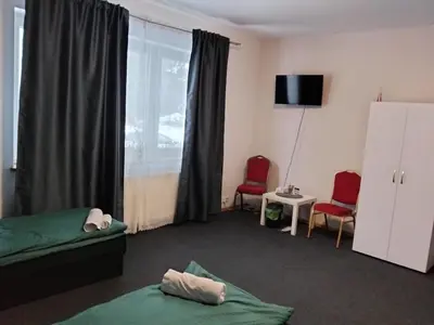 Łóżko lub łóżka w pokoju w obiekcie Villa Varzob lll