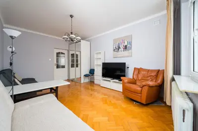 Telewizja i/lub zestaw kina domowego w obiekcie Warsaw Old Town Comfort Apartment by BookingHost