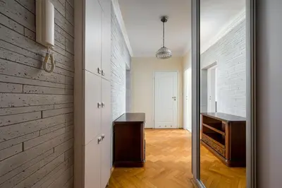 Łóżko lub łóżka w pokoju w obiekcie Warsaw Old Town Comfort Apartment by BookingHost