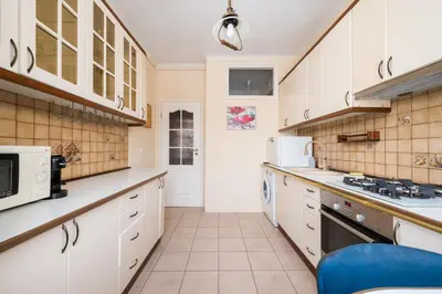 Kuchnia lub aneks kuchenny w obiekcie Warsaw Old Town Comfort Apartment by BookingHost