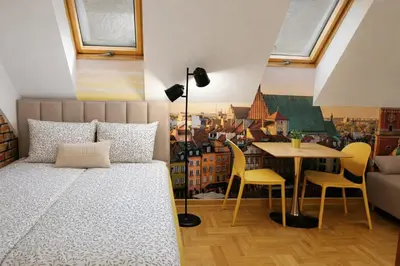 Łóżko lub łóżka w pokoju w obiekcie Castle apartment Piwna