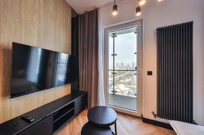 Telewizja i/lub zestaw kina domowego w obiekcie Kasprzaka 29 Wola Tower Apt z Wanną i Widokiem Na Panoramę Centrum By Perfect Apart 1231
