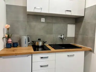 Kuchnia lub aneks kuchenny w obiekcie Dream Life Apartment