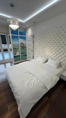 Łóżko lub łóżka w pokoju w obiekcie CTT Apartament Bakalarska