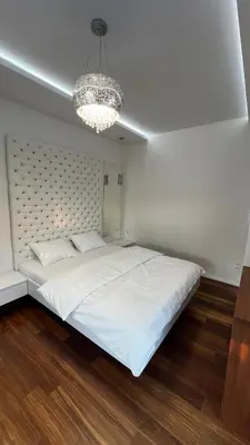 Łóżko lub łóżka w pokoju w obiekcie CTT Apartament Bakalarska