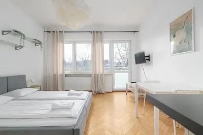 Łóżko lub łóżka w pokoju w obiekcie RentPlanet - Studio Hoża