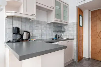 Kuchnia lub aneks kuchenny w obiekcie RentPlanet - Studio Hoża