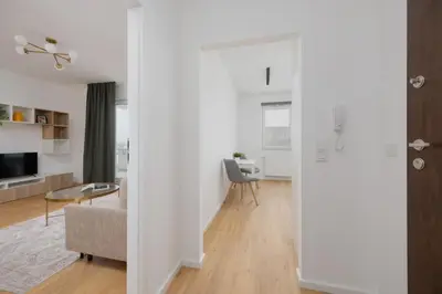 Telewizja i/lub zestaw kina domowego w obiekcie Gocław Harmony Apartments Znanieckiego by Solarento