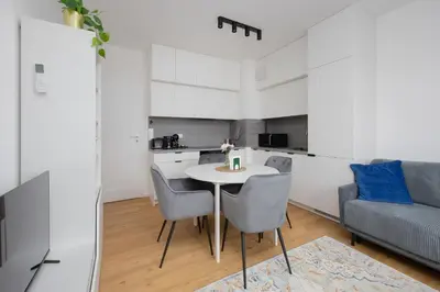 Kuchnia lub aneks kuchenny w obiekcie Gocław Prime Apartments Umińskiego by Solarento