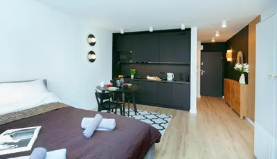 Łóżko lub łóżka w pokoju w obiekcie Comfy Stay Saska Studio