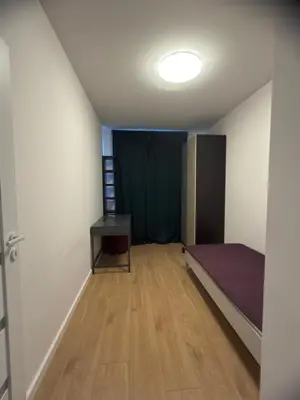 Łóżko lub łóżka w pokoju w obiekcie Mila Apartment Mokotow