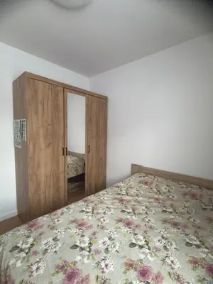 Łóżko lub łóżka w pokoju w obiekcie Mila Apartment Mokotow