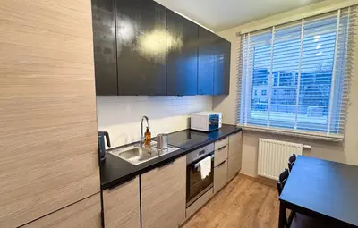 Kuchnia lub aneks kuchenny w obiekcie Warsaw City Haven Private Rooms