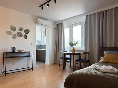Łóżko lub łóżka w pokoju w obiekcie Pańska 55 Comfort Studio by OhMyHome
