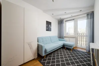 Część wypoczynkowa w obiekcie Warszawa Wola Center 3-Bedroom Apartment by BookingHost