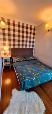 Łóżko lub łóżka w pokoju w obiekcie HomeComfort Apartament Boho