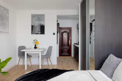 Łóżko lub łóżka w pokoju w obiekcie Comfortable Studio for 2 People with an Ideal Location by Noclegi Renters