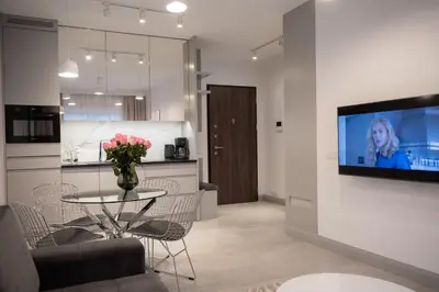 Telewizja i/lub zestaw kina domowego w obiekcie MENNICA RESIDENCE PRESTIGE Apartments